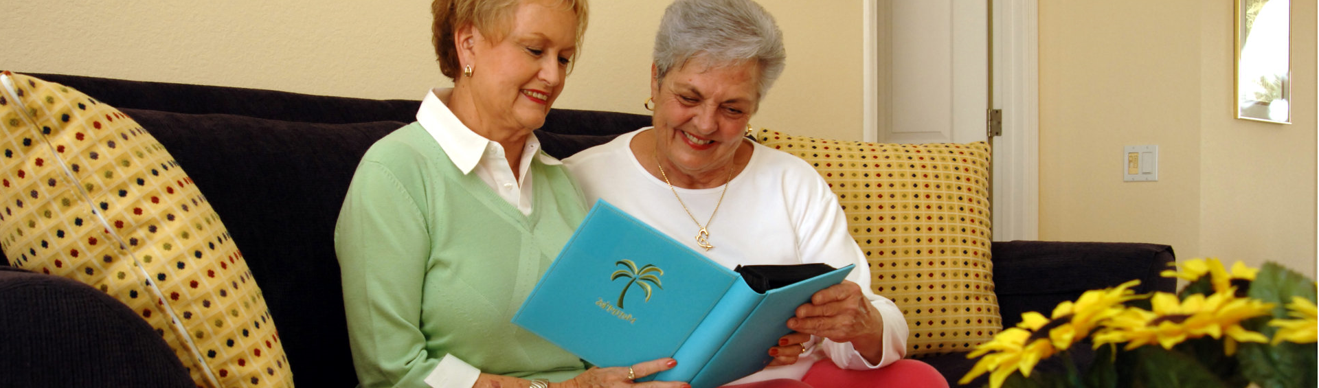 elder accopanied to walk by a caregiver 