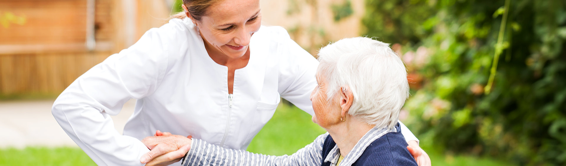 caregiver helping elder